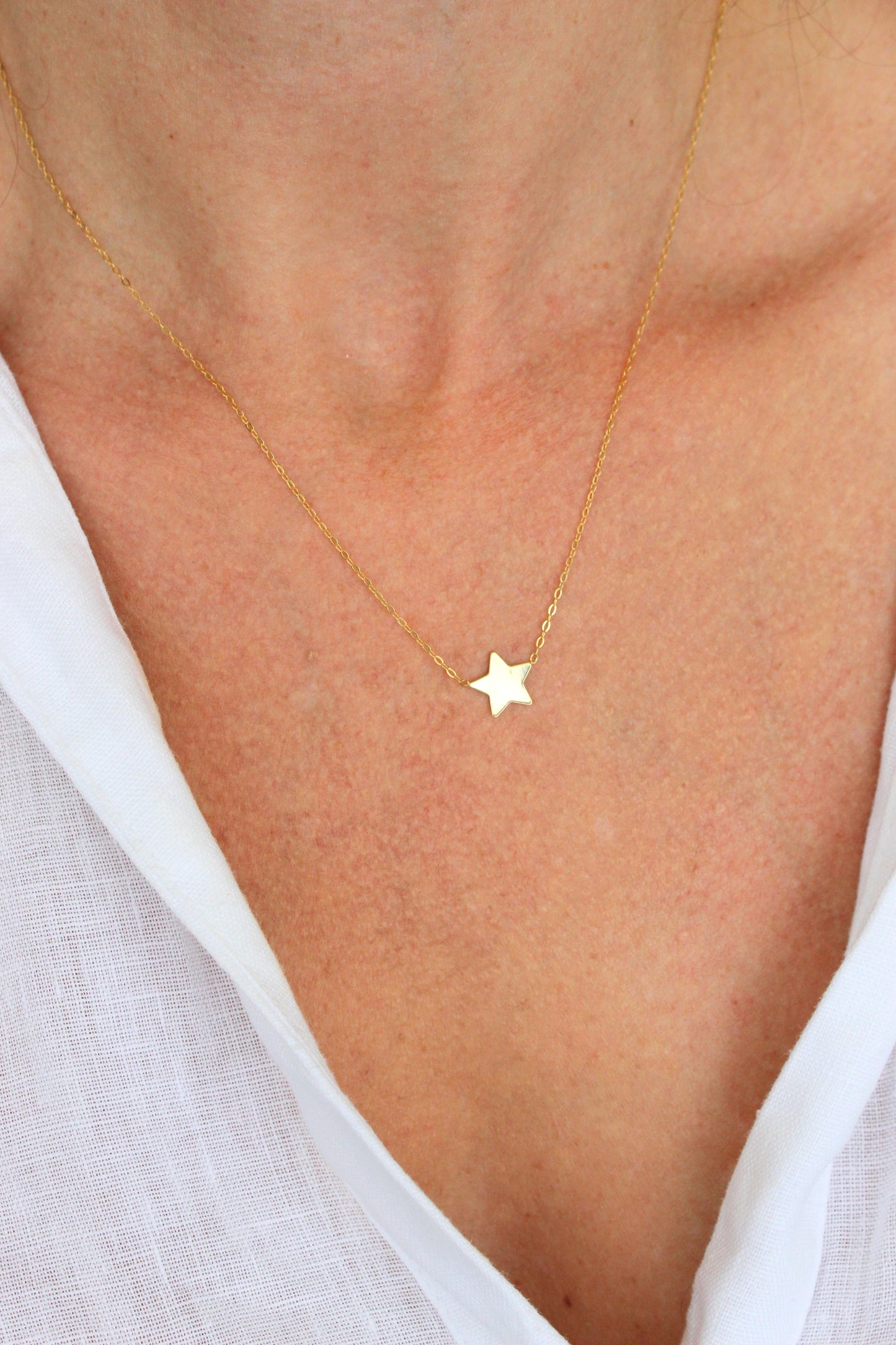 Collar estrella Oro amarillo 14k